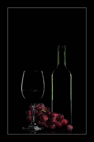 Bodegón vino y uvas